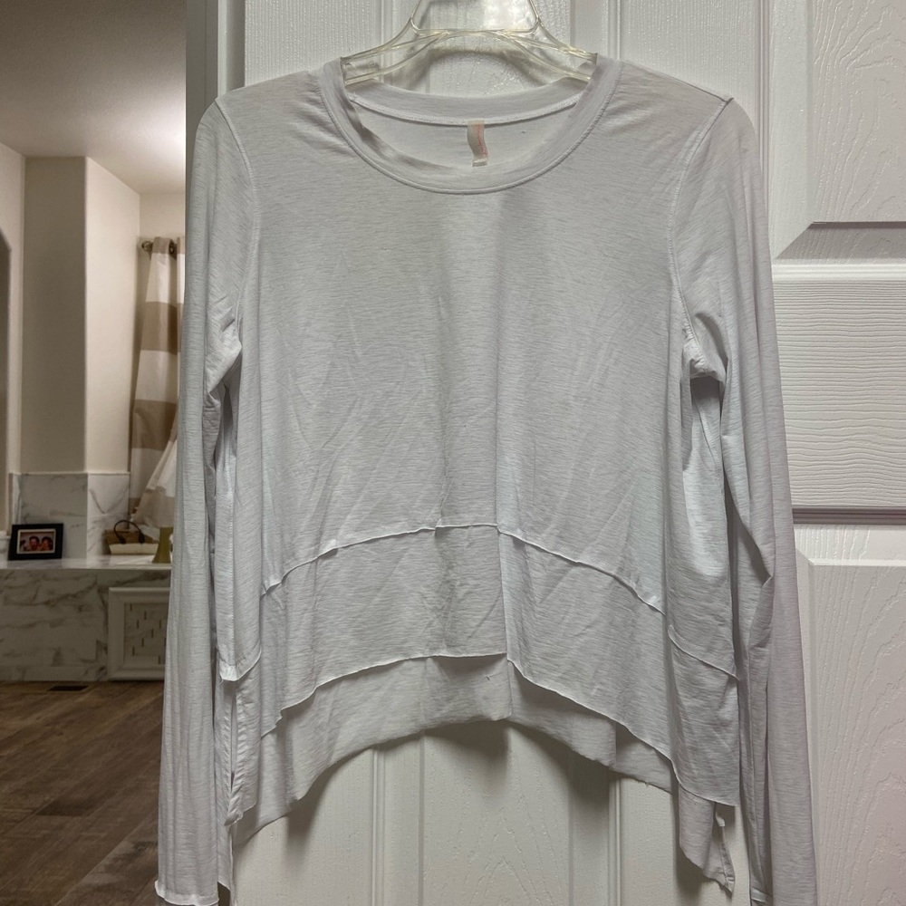 FP Movement by Free People white tempo long sleeve shirt. Size M